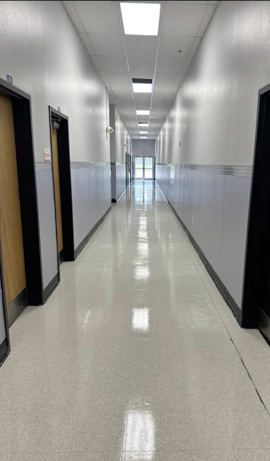 High-gloss commercial floor restored by BlueSky's floor stripping & waxing program